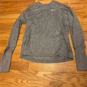 Nike grey drifit long sleeve shirt size xs women’s worn a couple times no stains